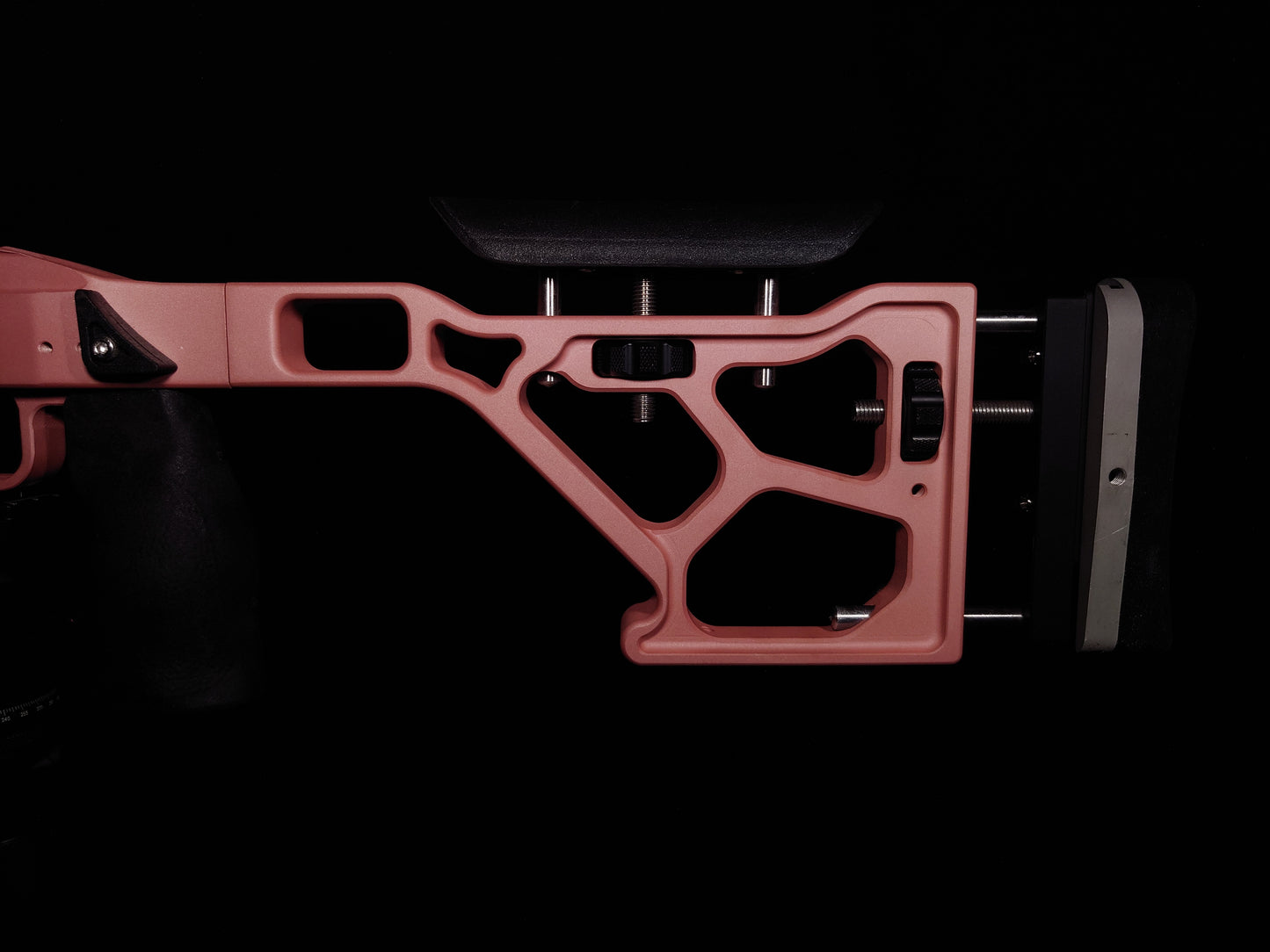 Rear angle of the Delta 22 Chassis, highlighting the adjustable stock system and ergonomic cut outs for weight optimization