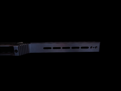 Side view of the Alpha Chassis in Sniper Grey, designed with arca/picatinny rail M-LOK slots for modular attachments and enhanced versatility