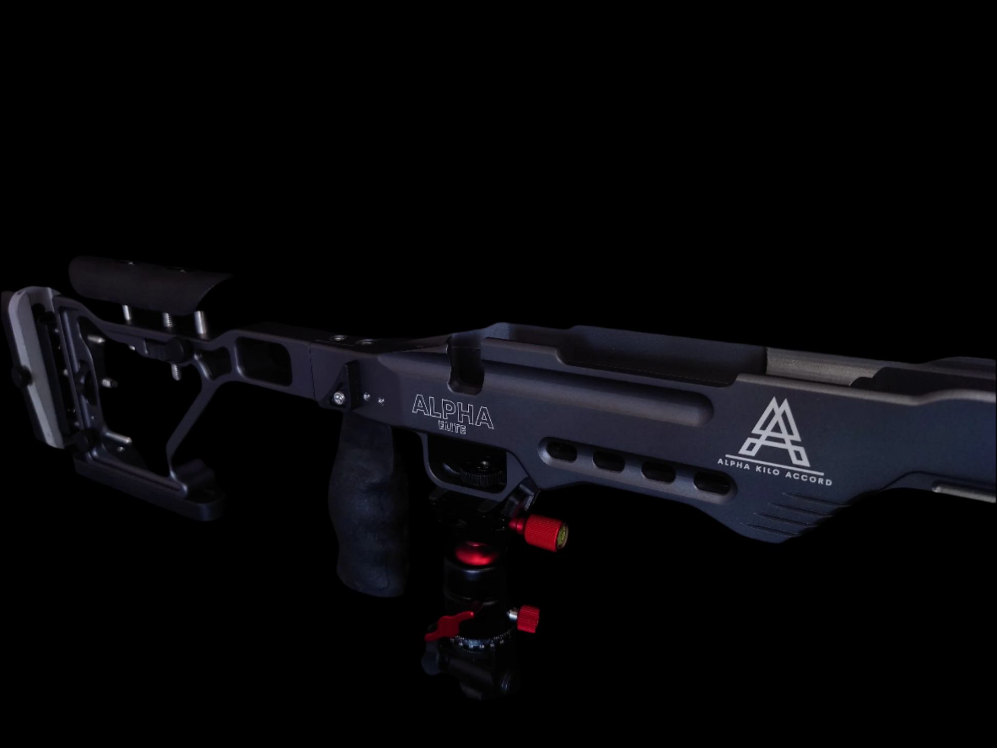 Close-up of the Alpha Chassis in Sniper Grey, featuring the Alpha Kilo Accord branding and vented chassis design
