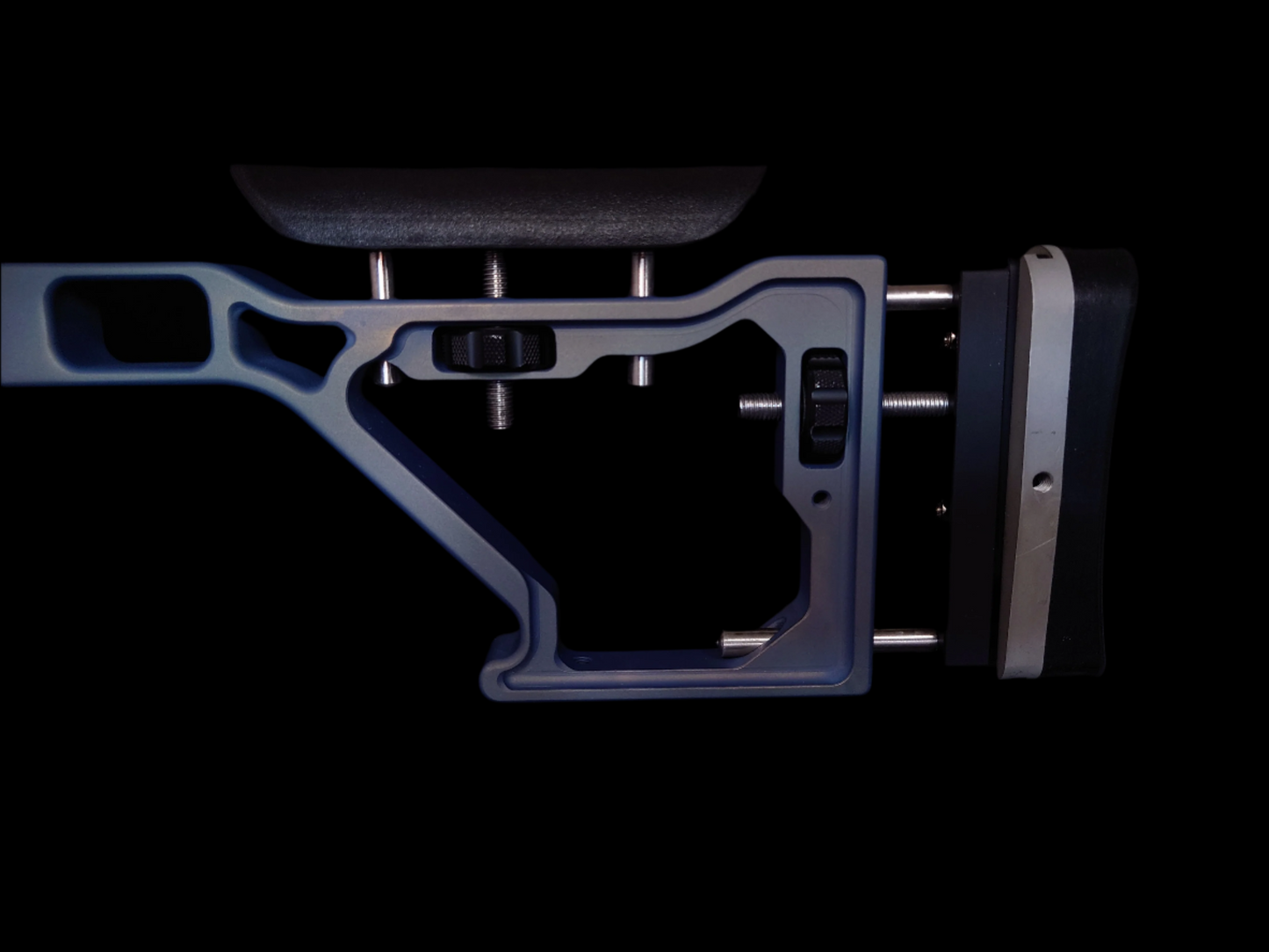 Adjustable stock of the Bravo 22 Chassis in Northern Lights, featuring an ergonomic cheek riser and recoil pad for shooter comfort